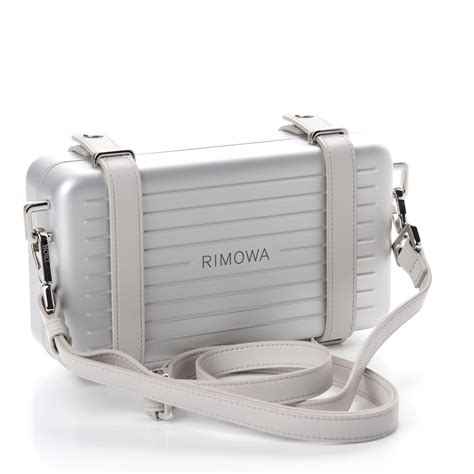 dior x rimowa clutch price|christian dior silver clutch.